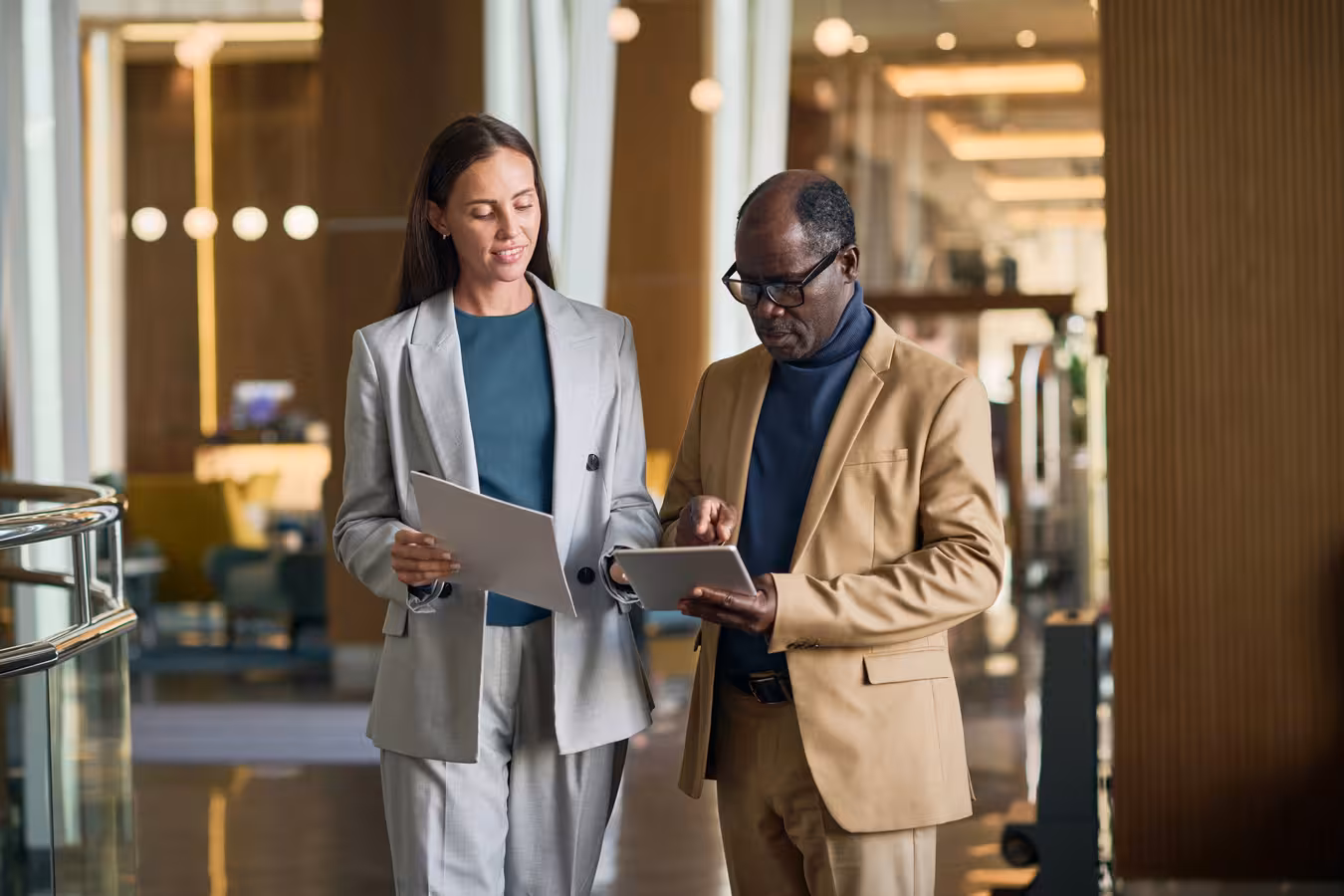 colleagues-discussing-online-work-on-tablet-pc-2025-02-11-15-30-41-utc_converted