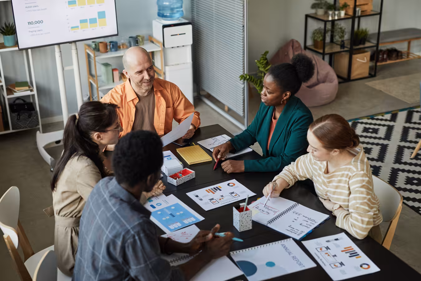 diverse-business-team-meeting-at-table-2025-03-05-23-06-37-utc_converted
